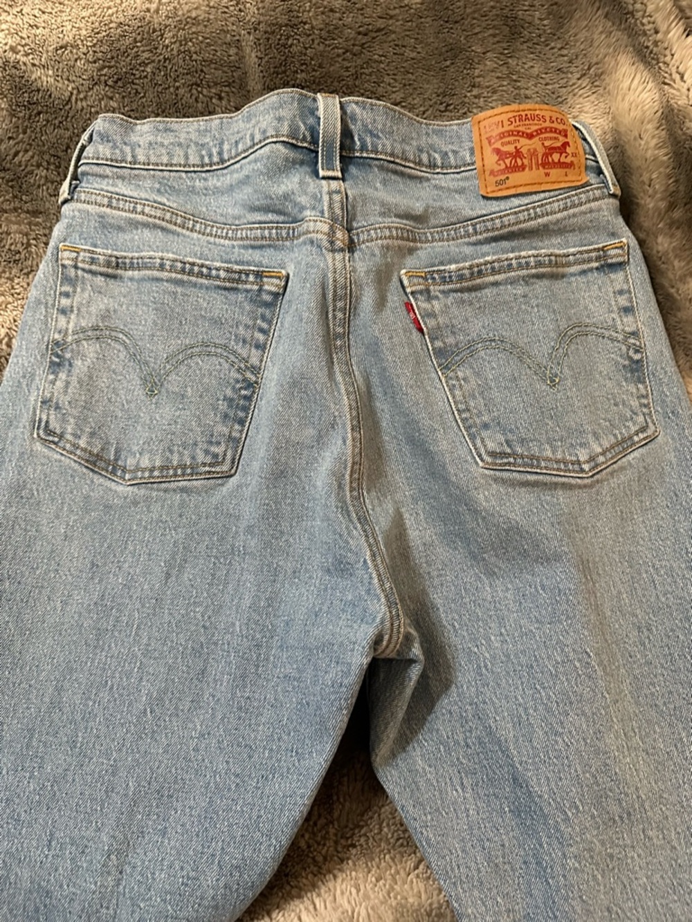 Levi's Light Blue Denim Jeans with Tan Stitching
